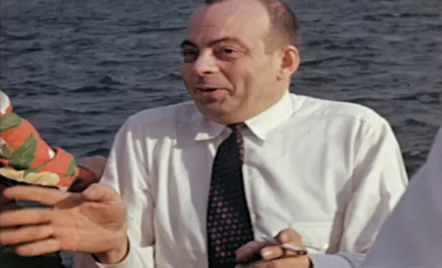 A still image of Saint-Exupéry during a boat excursion on a lake near Montreal, Canada, filmed in May 1942.